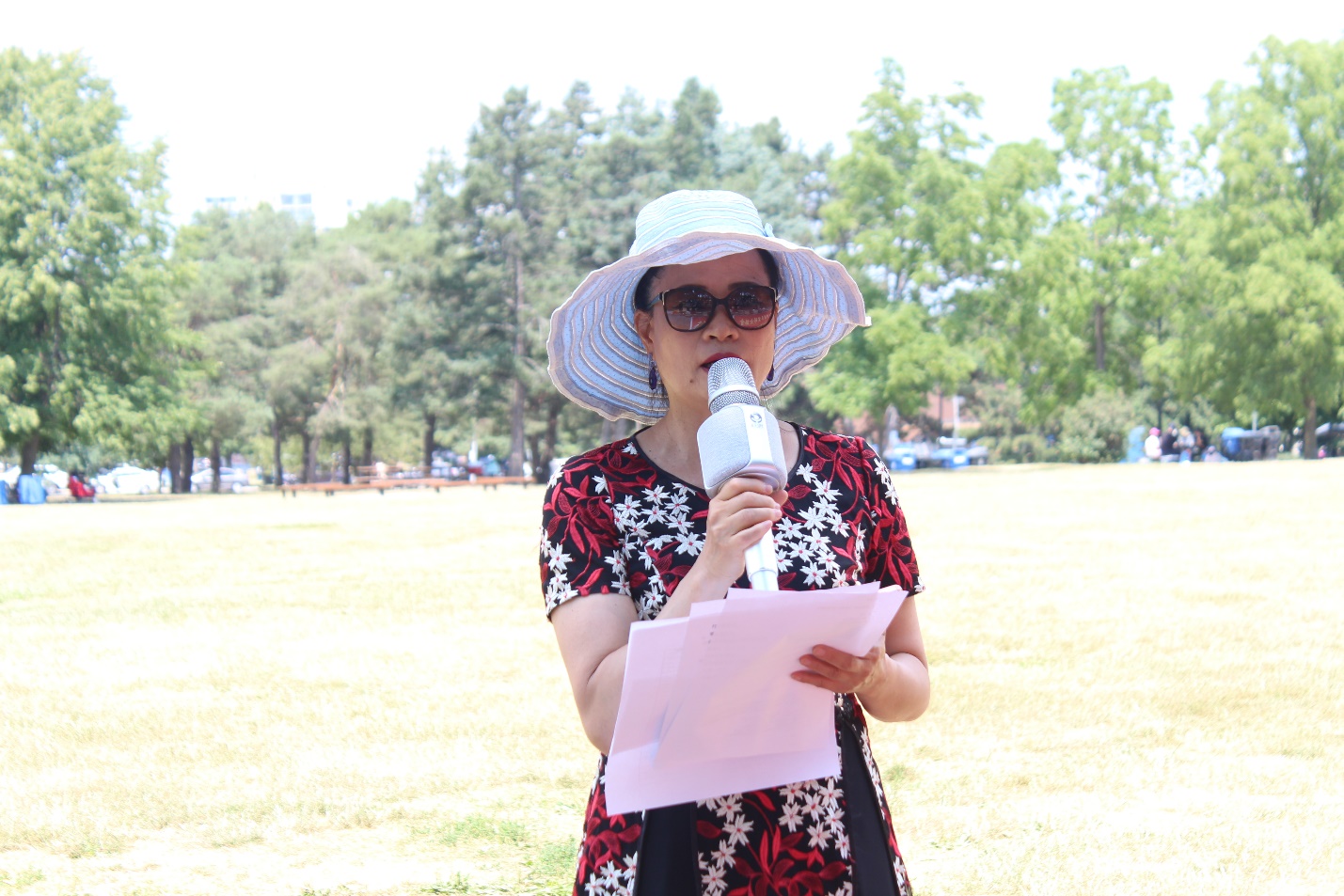 A person holding a bottle of water Description automatically generated with low confidence